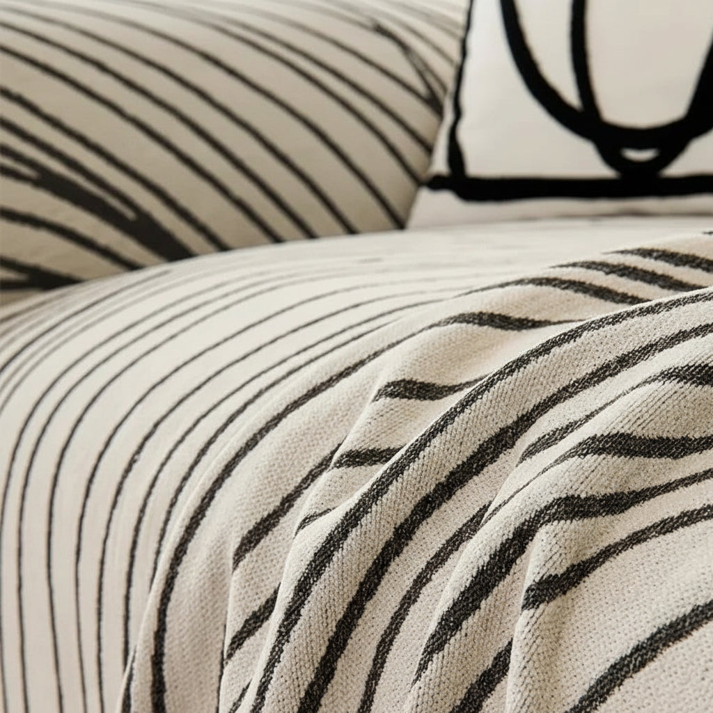 Close-up of zebra-striped fabric with text describing its texture and softness.