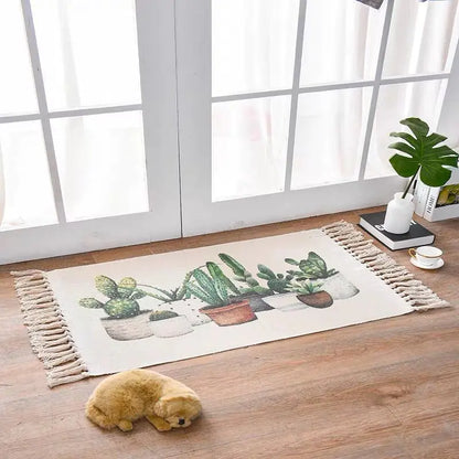 Decorative rug with cactus design on a wooden floor near a window.