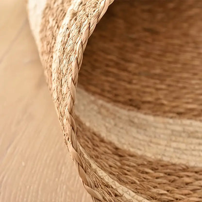 Close-up of a woven basket with natural fibers on a wooden surface