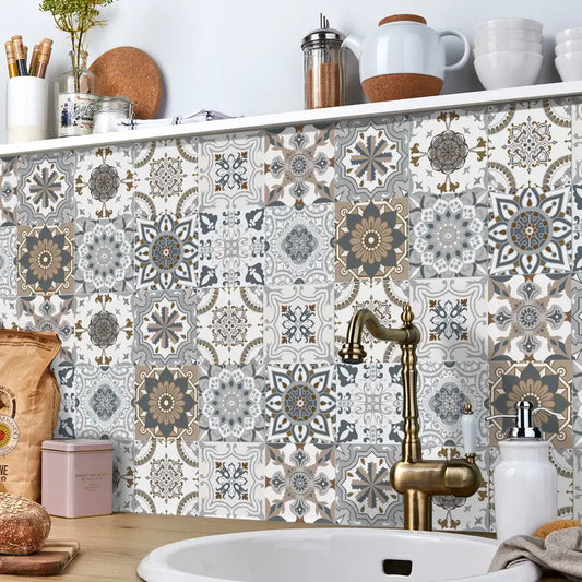 Kitchen with decorative tile backsplash and brass faucet