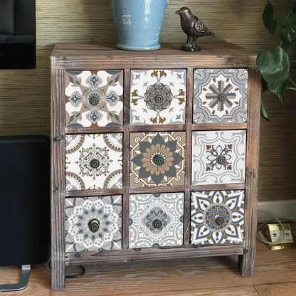 Wooden cabinet with patterned doors on a wooden floor.