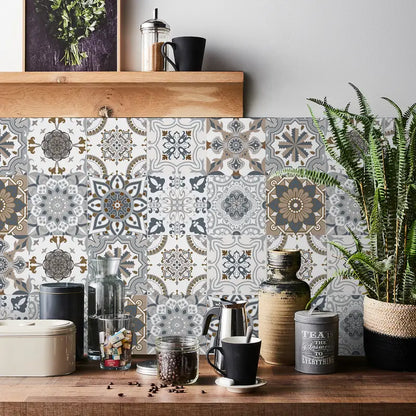 Decorative tile backsplash with geometric patterns, wooden shelf with kitchen items, and potted plant.