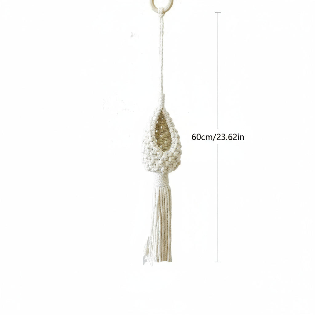 Decorative hanging plant holder with measurements on a white background